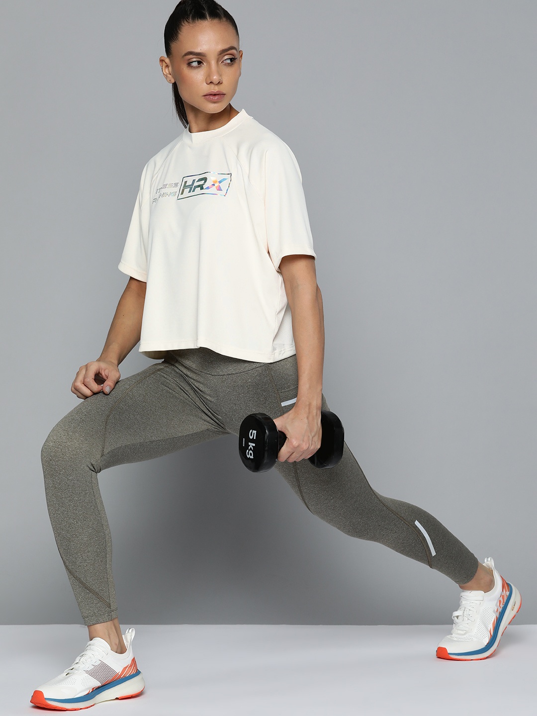 

HRX By Hrithik Roshan Training Women Optic White Rapid-Dry Solid Tshirts, Off white