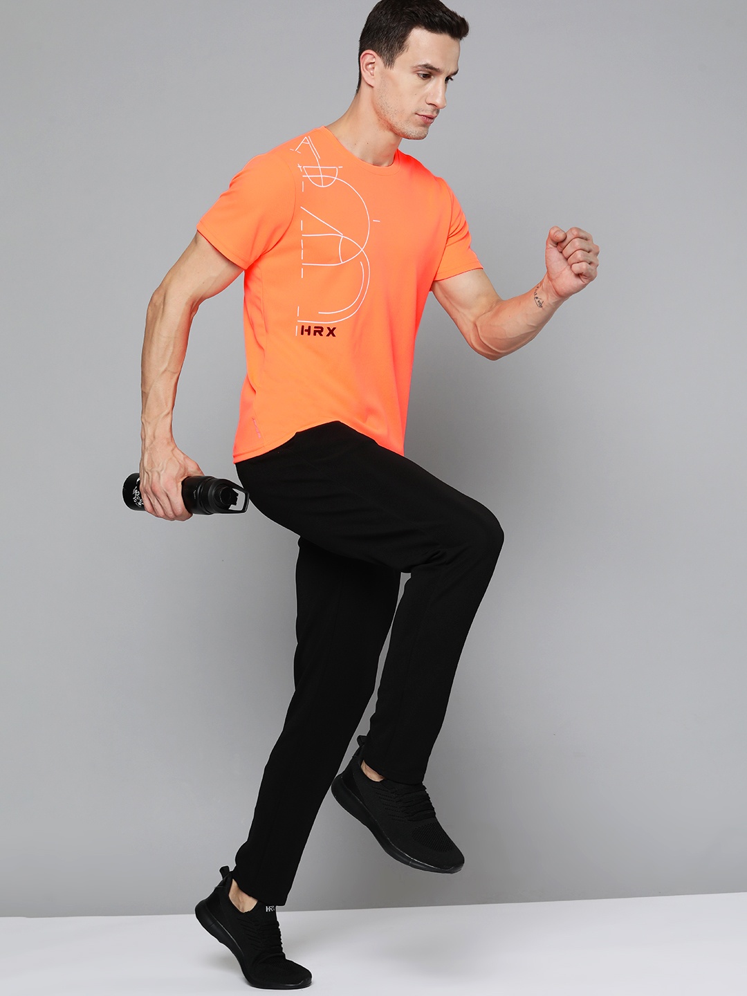 

HRX By Hrithik Roshan Running Men Neon Orange Rapid-Dry Brand Carrier T-shirts