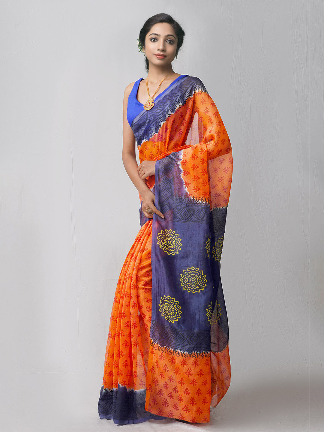 

Unnati Silks Orange & Blue Ethnic Motifs Supernet Block Print Saree