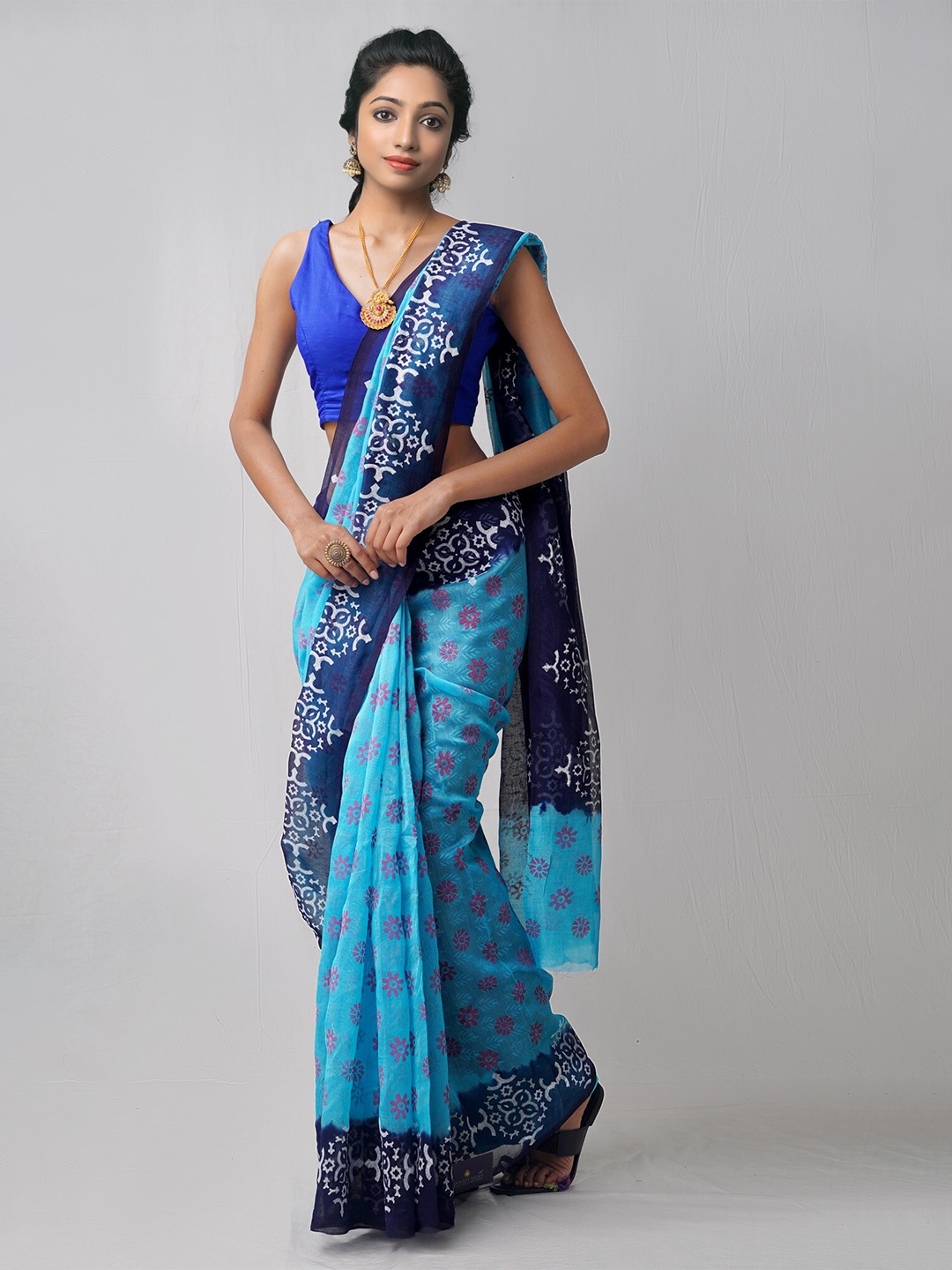 

Unnati Silks Blue & Pink Ethnic Motifs Block Printed Net Saree