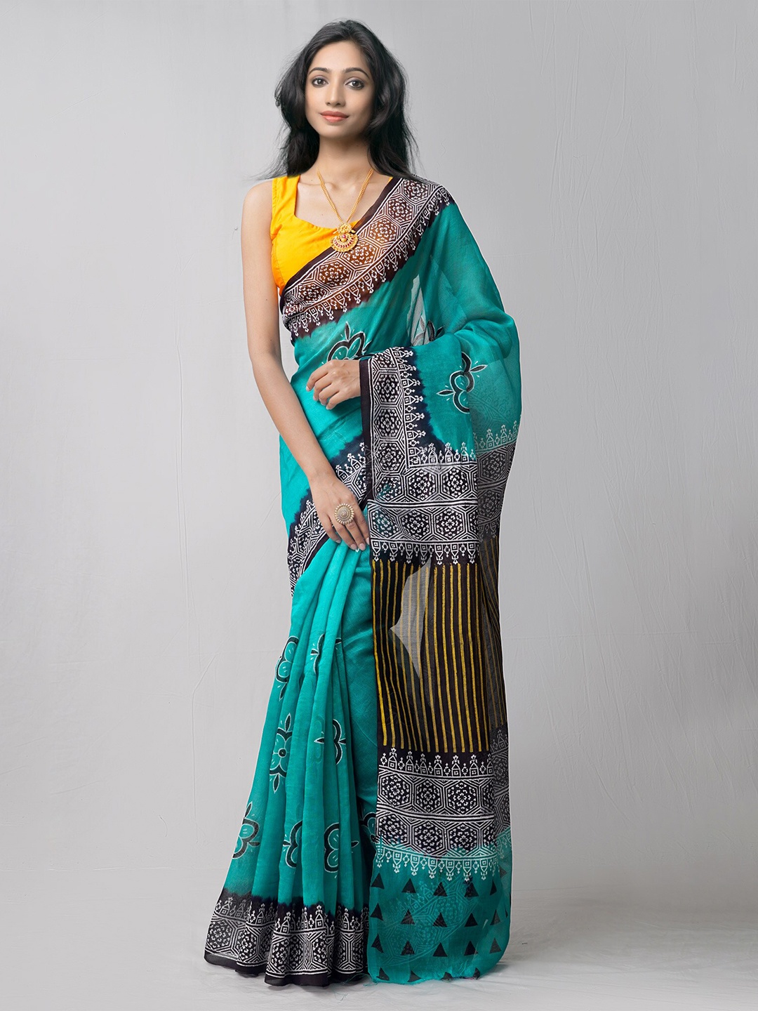 

Unnati Silks Green & Black Ethnic Motifs Net Block Print Saree