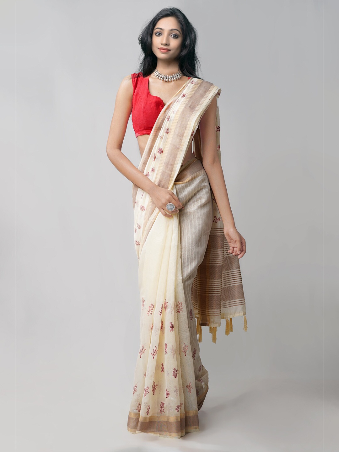 

Unnati Silks Cream-Coloured & Red Floral Zari Silk Cotton Chanderi Saree