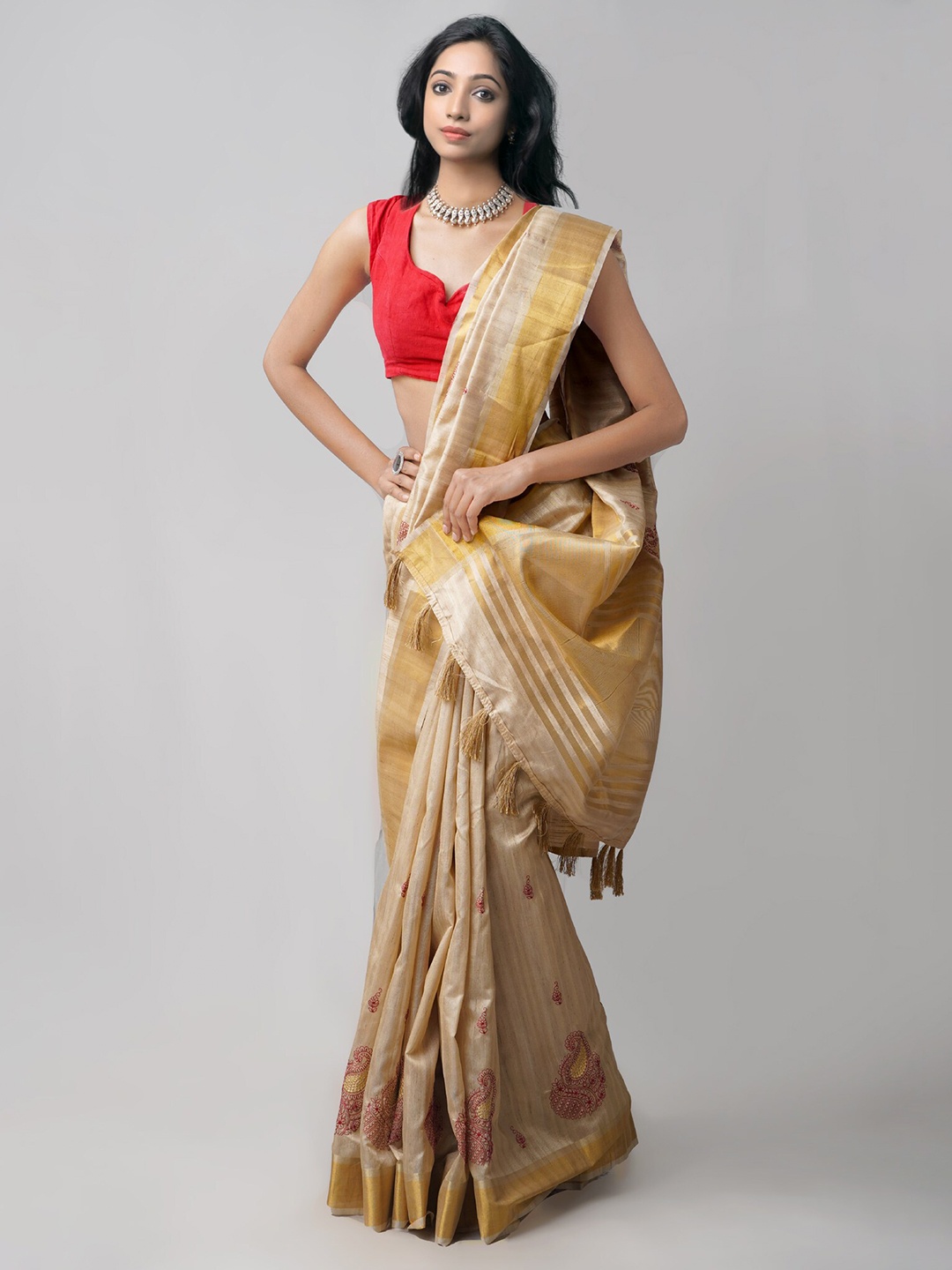 

Unnati Silks Brown & Red Ethnic Motifs Embroidered Zari Silk Blend Tussar Saree