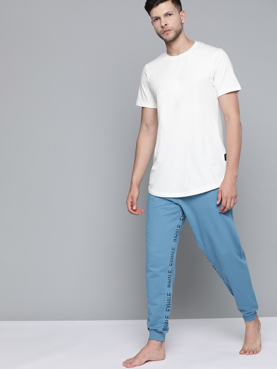

HRX By Hrithik Roshan Yoga Men Niagra Organic Cotton Typography Track Pants, Blue