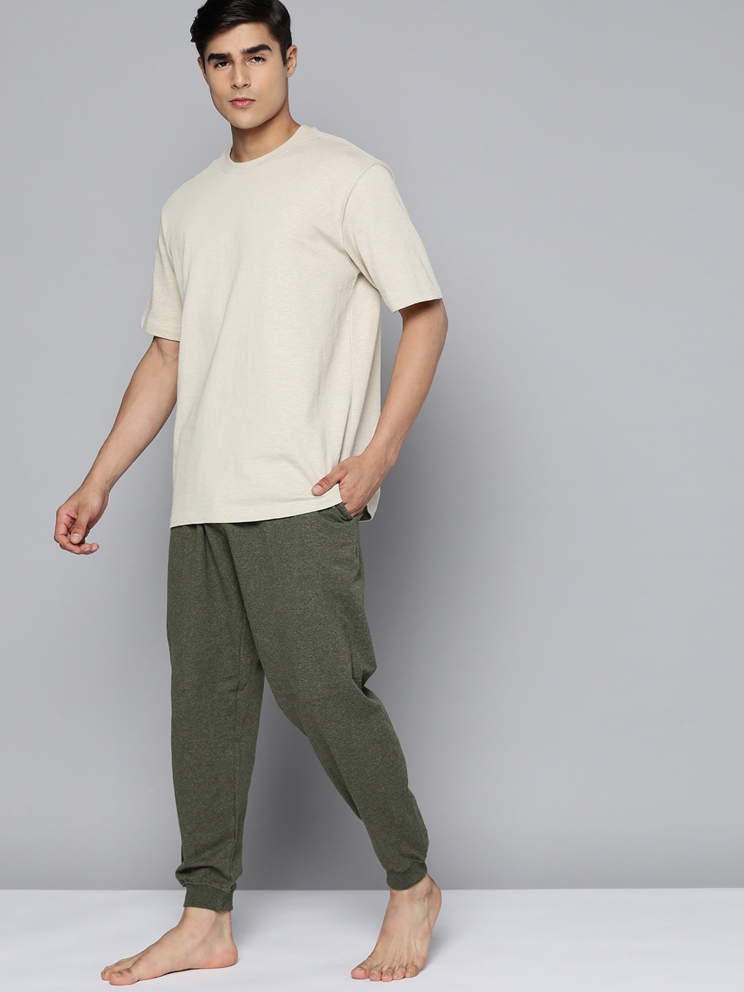

HRX By Hrithik Roshan Yoga Men Green Melange Cotton Typography Track Pants, Olive