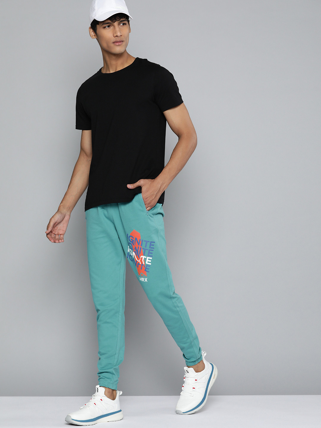 

HRX By Hrithik Roshan Lifestyle Men Porcelain Bio-Wash Brand Carrier Track Pants, Sea green