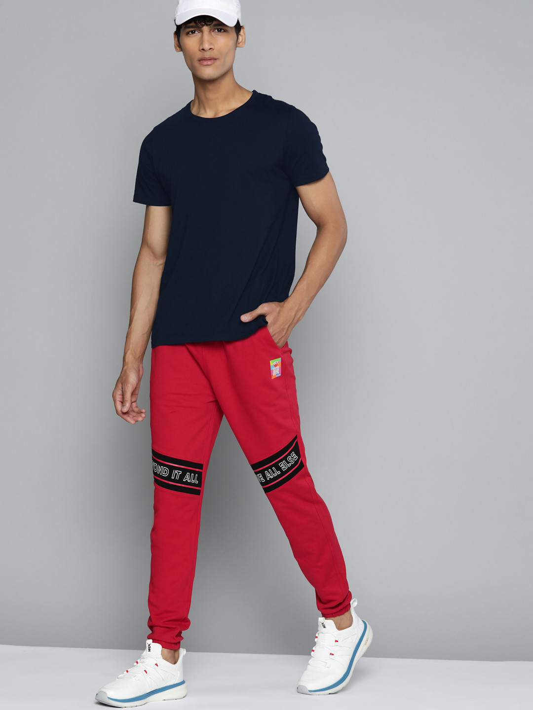 

HRX By Hrithik Roshan Lifestyle Men Barbadoss Cherry Bio-Wash Typography Track Pants, Red