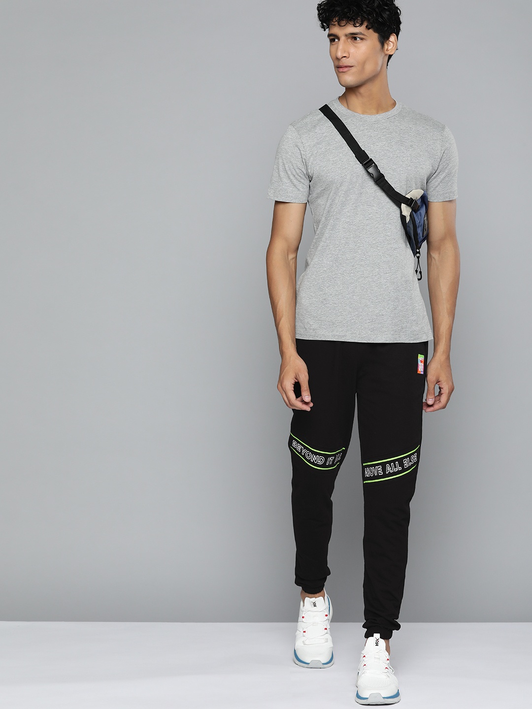 

HRX By Hrithik Roshan Lifestyle Men Jet Black Bio-Wash Typography Track Pants