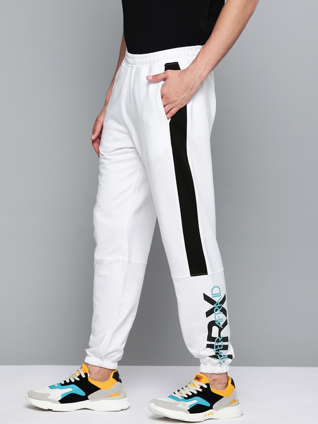 

HRX By Hrithik Roshan Lifestyle Men Optic White Gold Finish Typography Track Pants