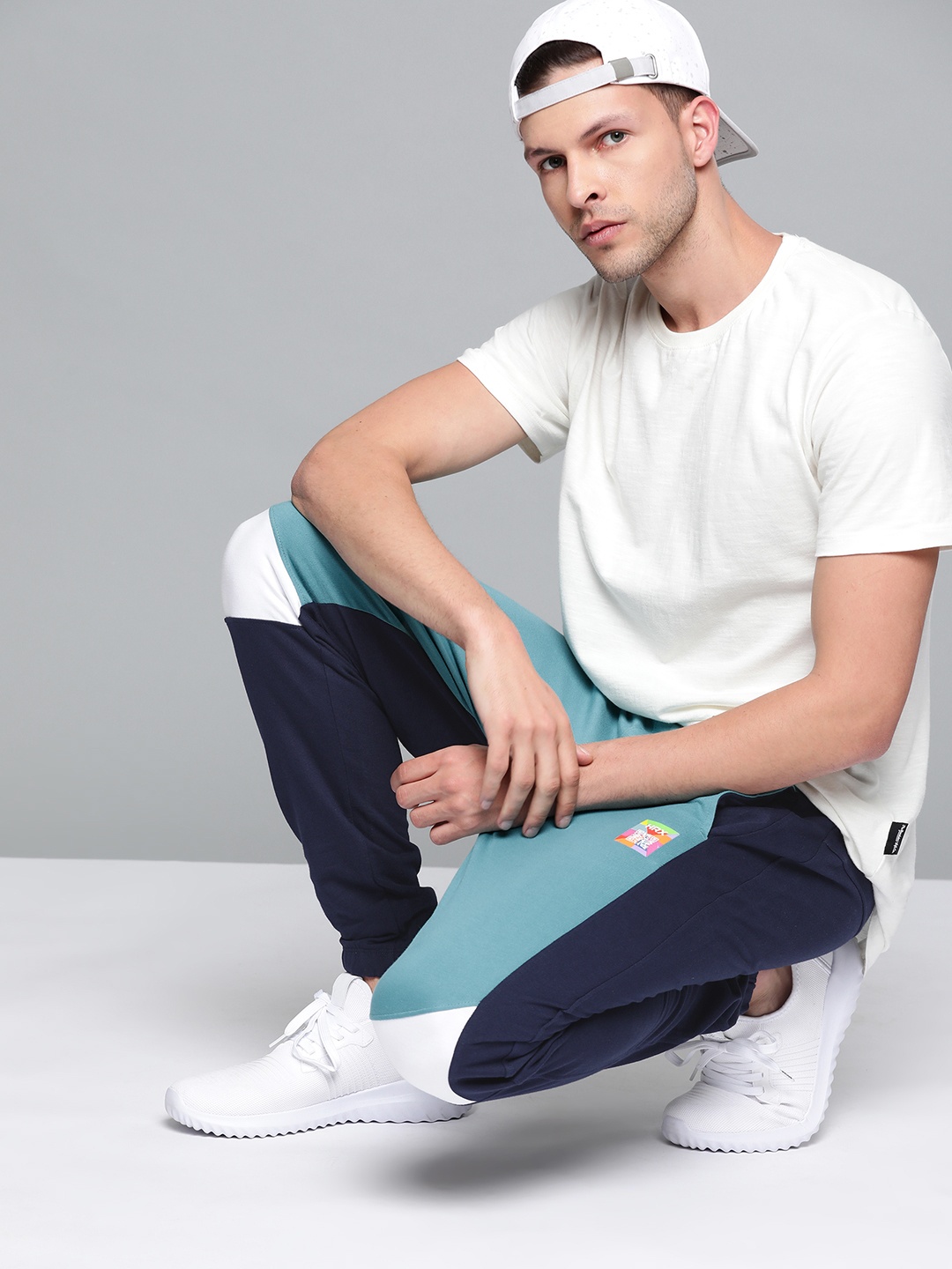 

HRX By Hrithik Roshan Lifestyle Men Porcelain Bio-Wash Colourblock Track Pants, Blue