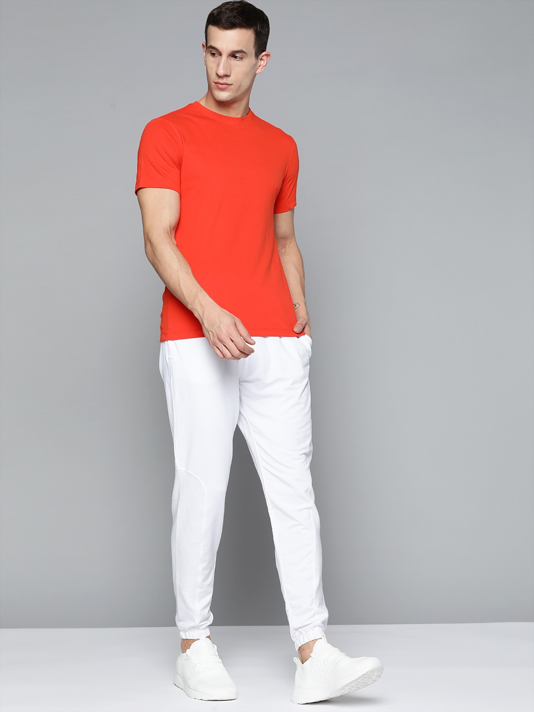

HRX By Hrithik Roshan Lifestyle Men Optic White Gold Finish Solid Track Pants