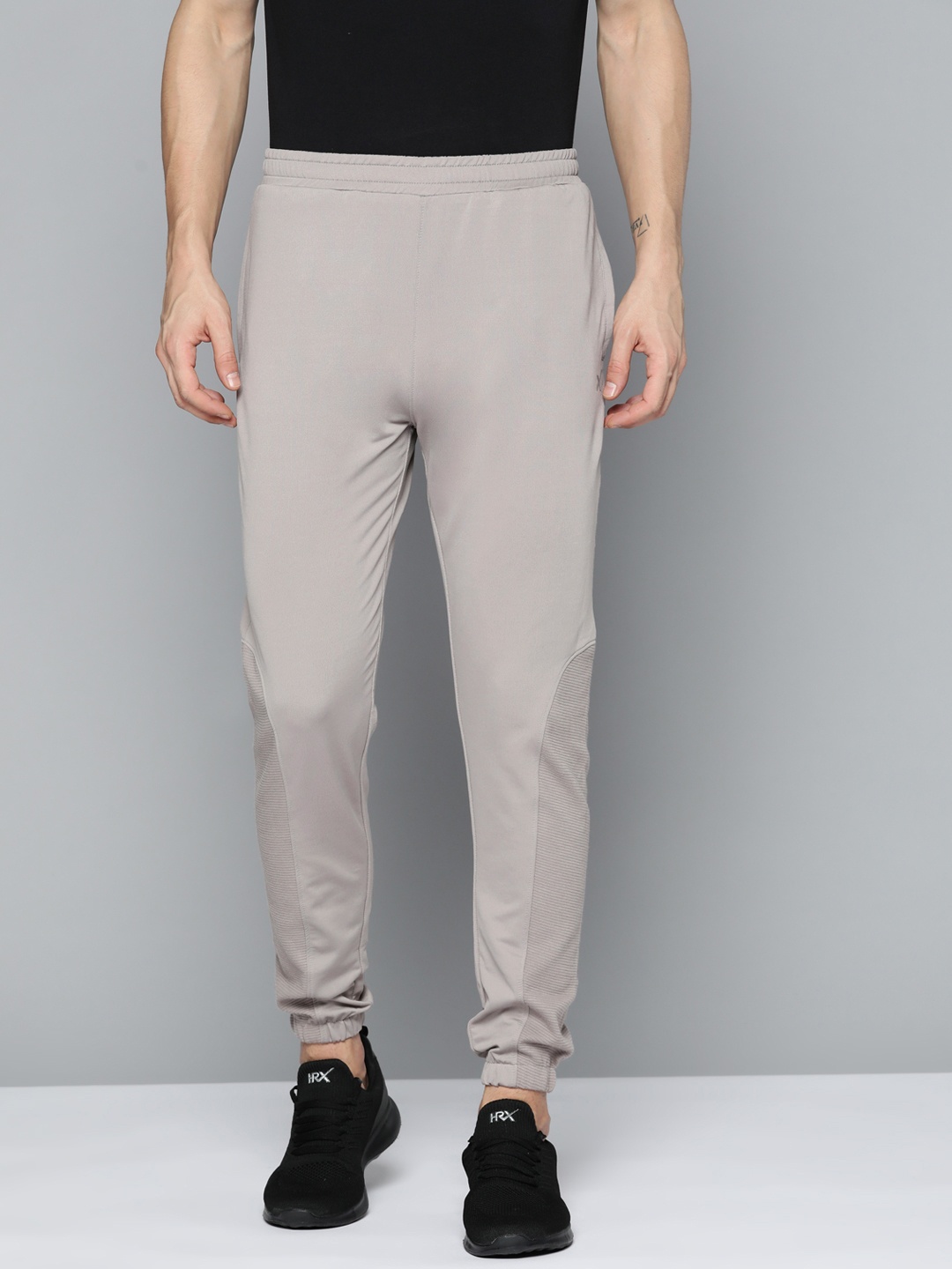 

HRX By Hrithik Roshan Lifestyle Men Wet Weather Gold Finish Solid Track Pants, Grey