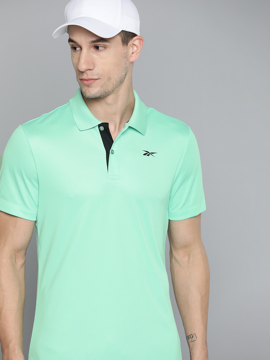 

Reebok Men Sea Green Brand Logo Polo Collar Speedwick T-shirt