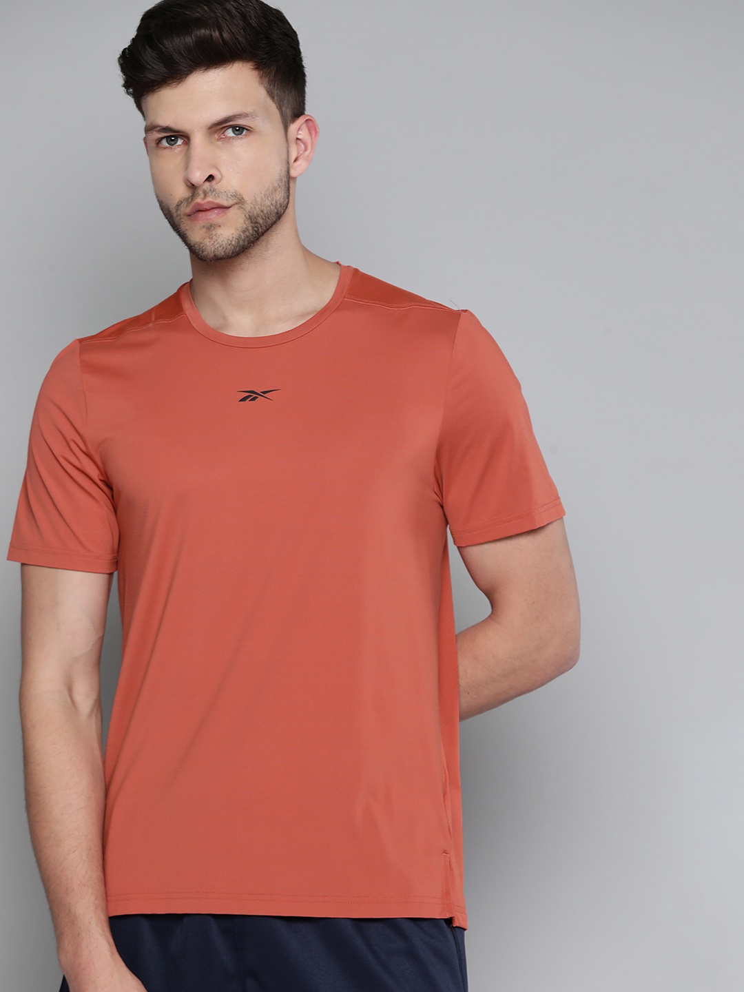 

Reebok Men Rust Orange TS AC Solid Activchill Training T-shirt