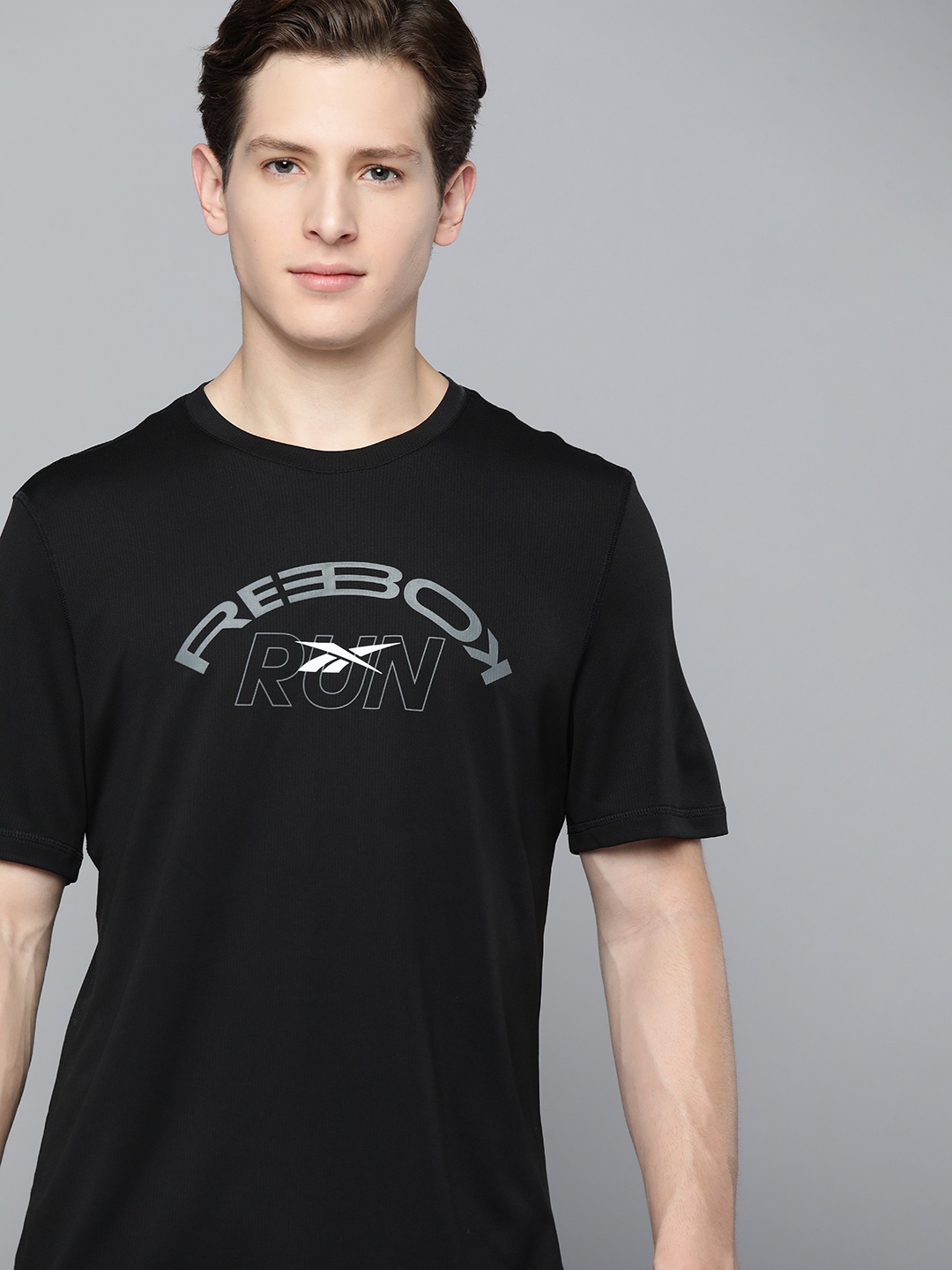 

Reebok Men Black RE SS Graphic Running T-shirt