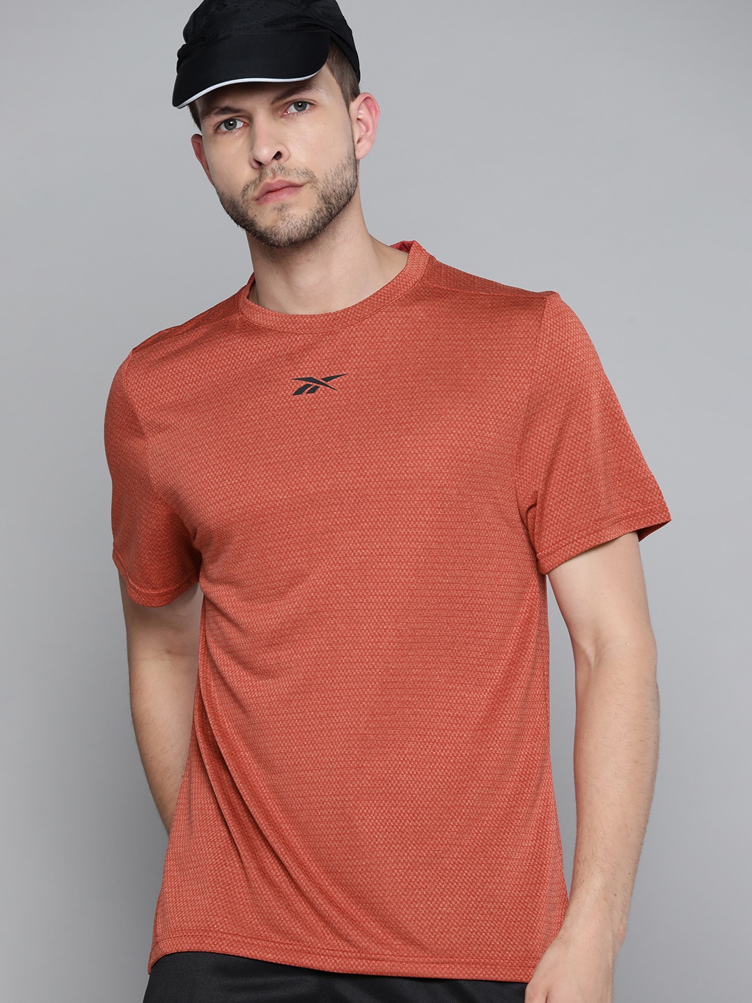 

Reebok Men Rust Orange WOR Readywear Solid Training T-shirt