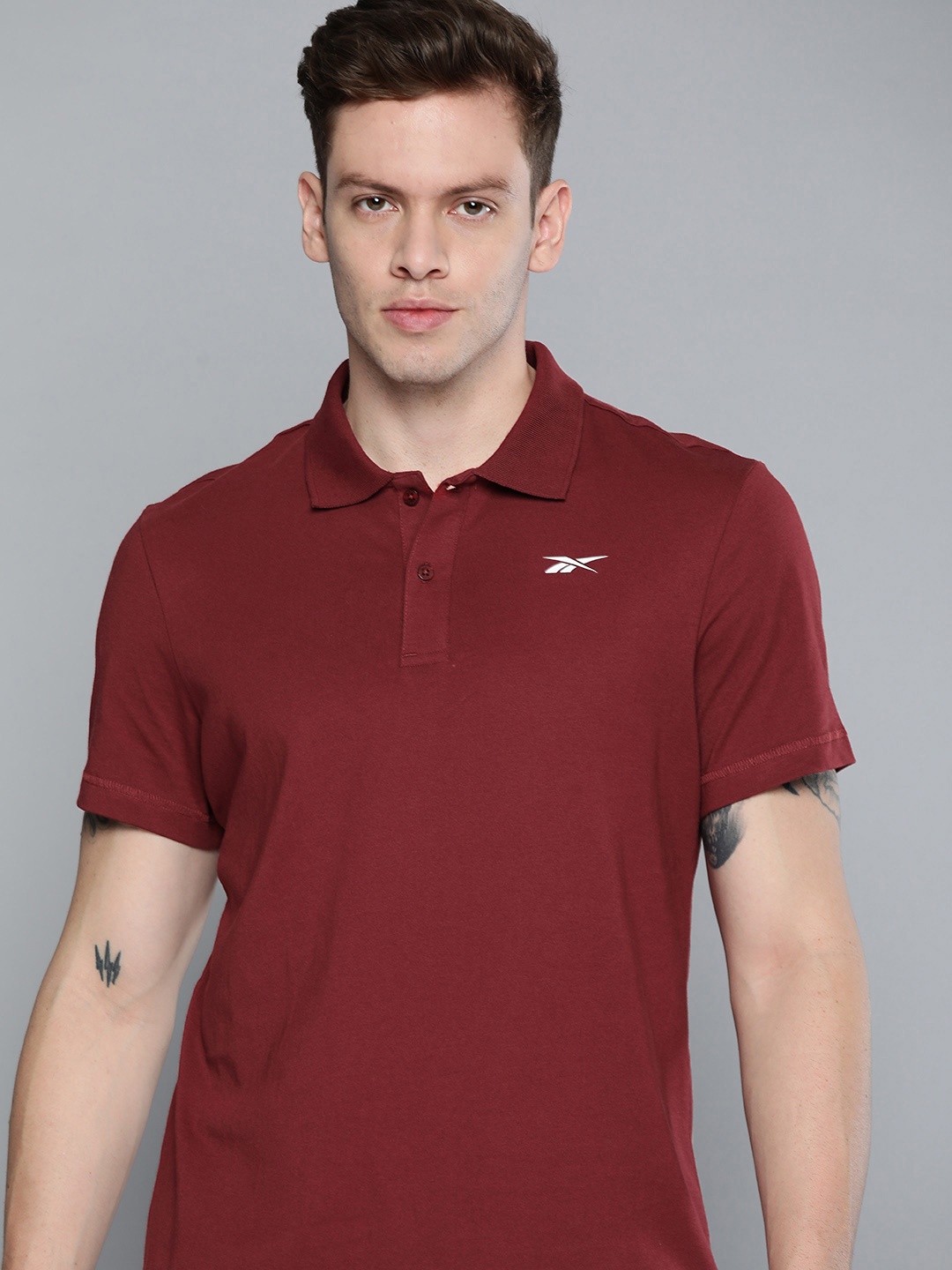 

Reebok Men Maroon Polo Collar Pure Cotton T-shirt