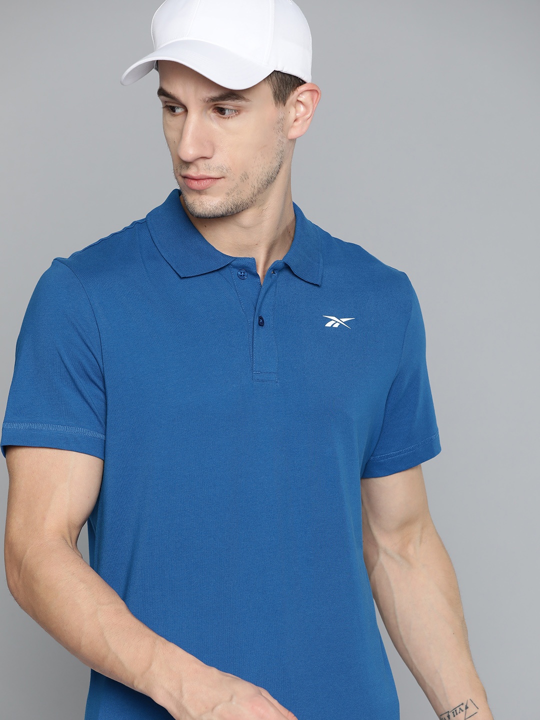 

Reebok Men Blue Polo Collar Pure Cotton Training T-shirt