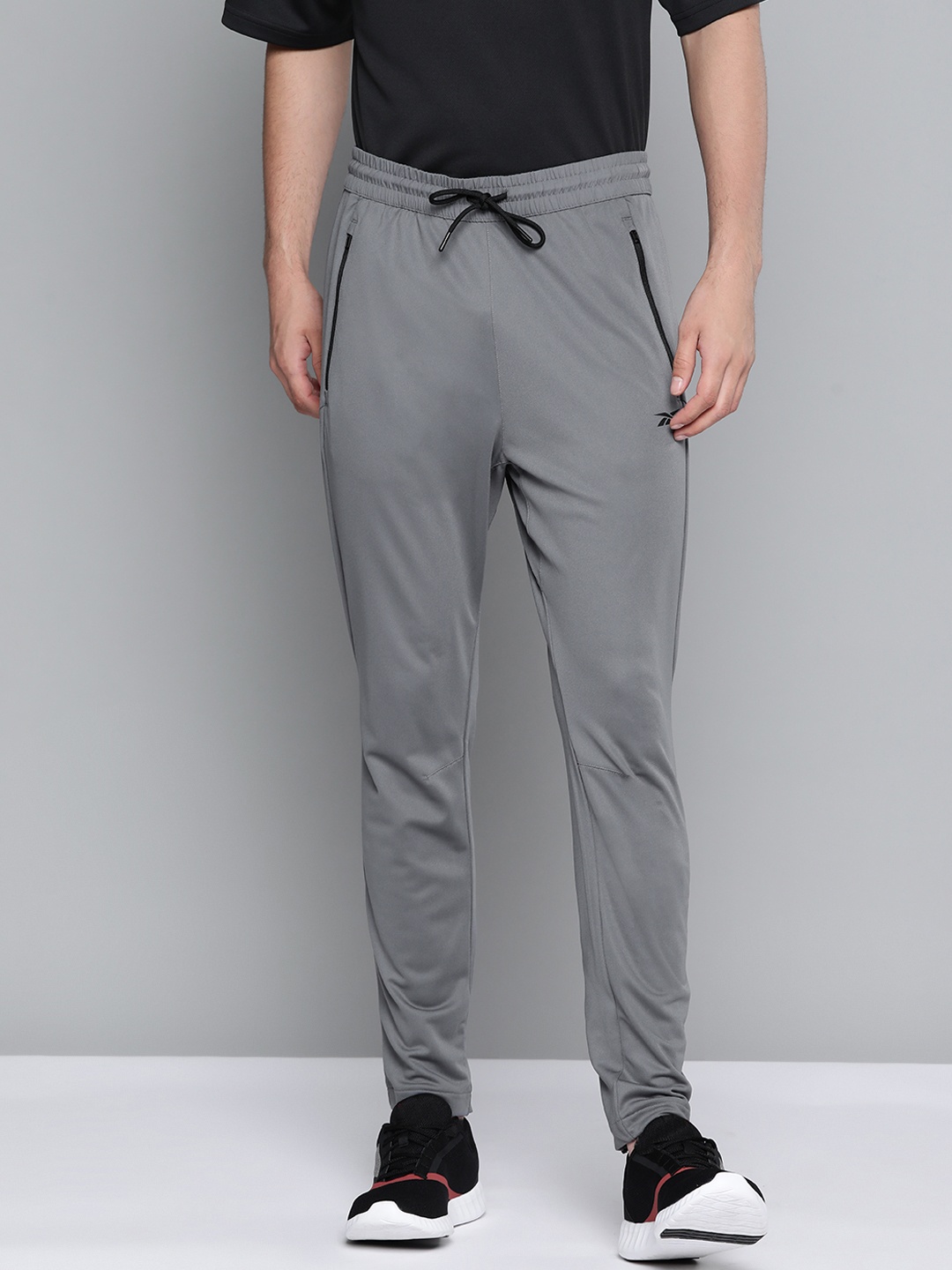 

Reebok Men Grey Solid Training Track Pants