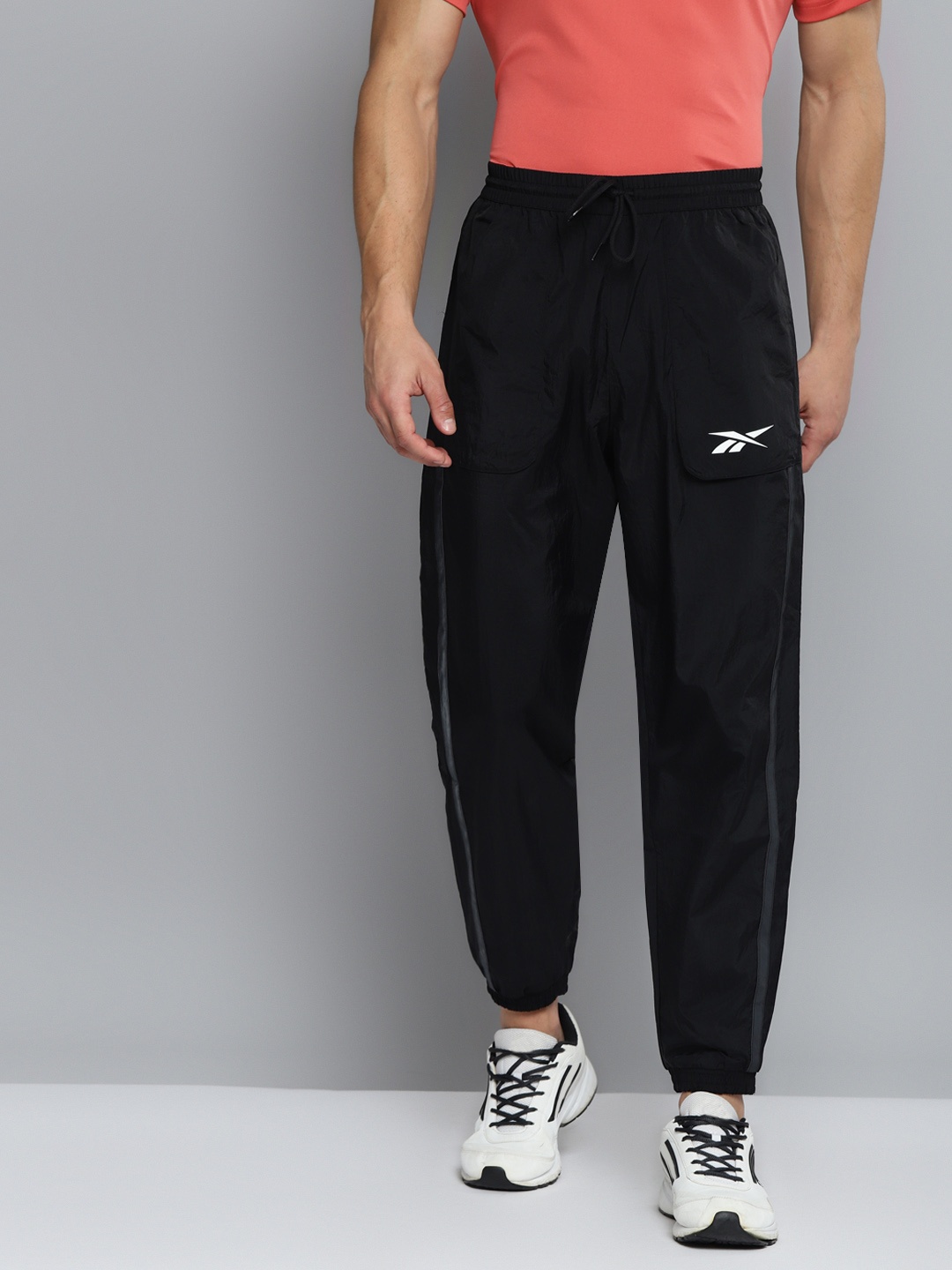 

Reebok Men Black Solid MYT Woven Training Joggers