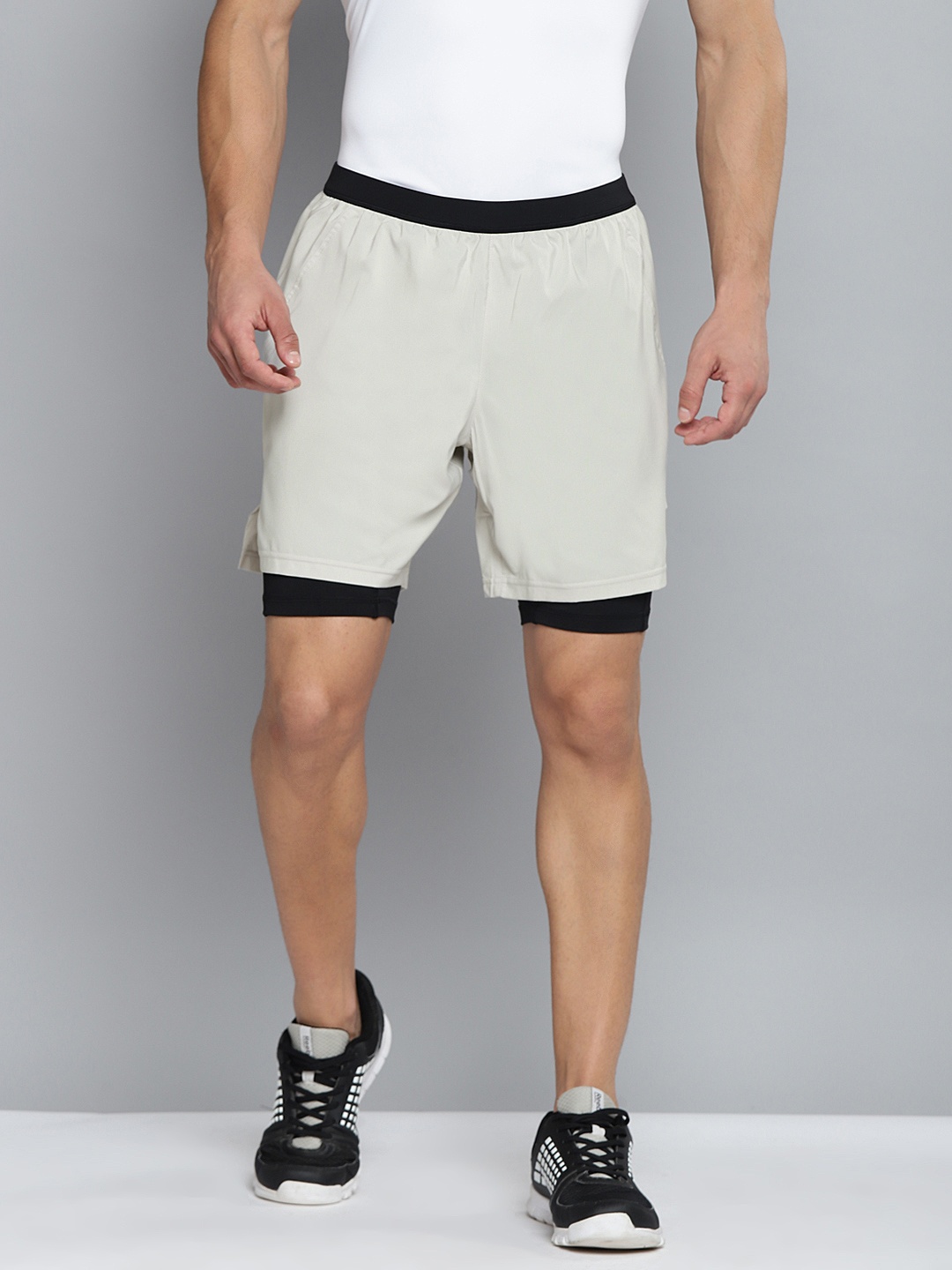 

Reebok Men Off White Solid RE 2-1 Sports Shorts
