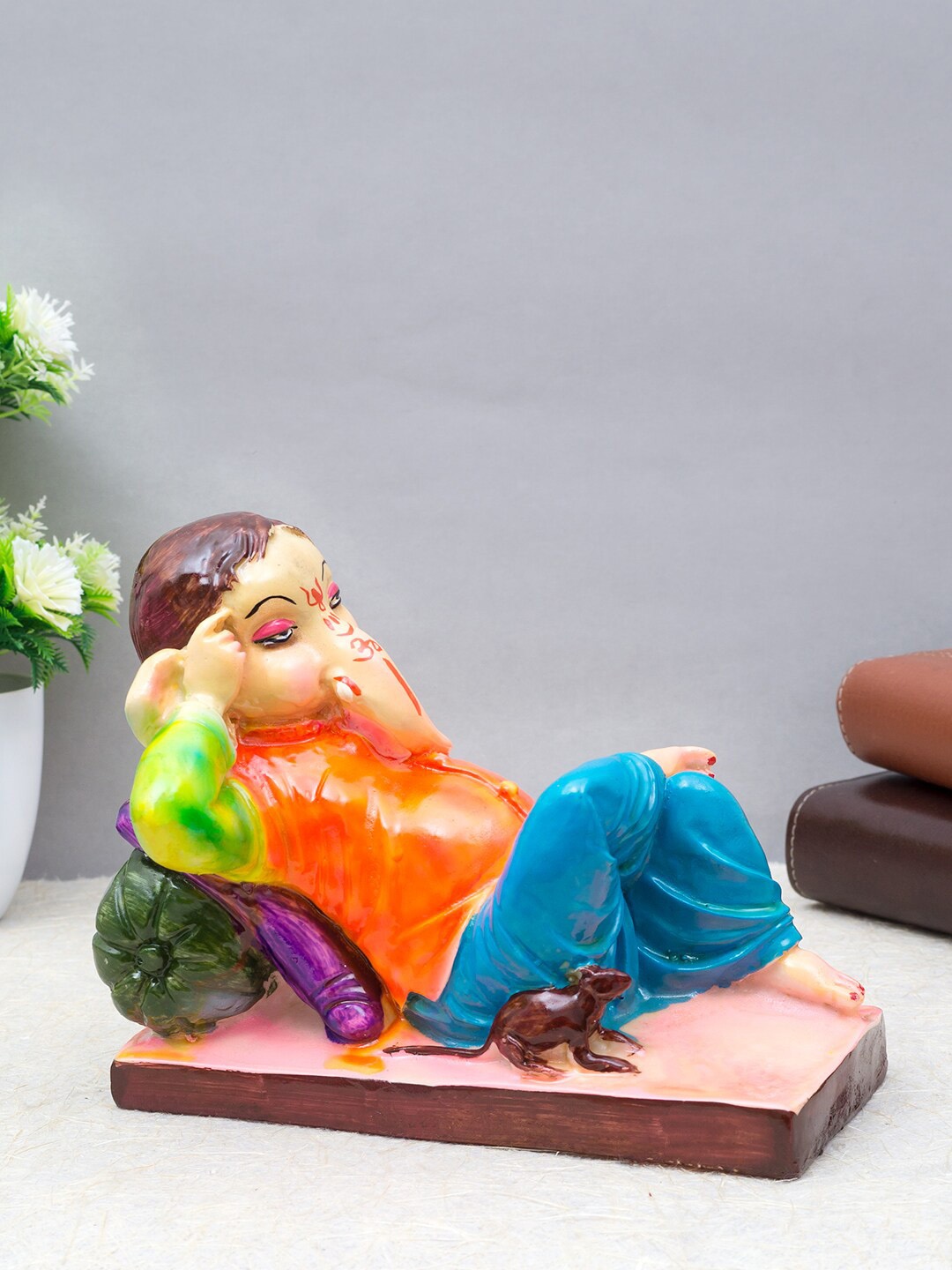 

Golden Peacock Blue & Orange Lord Ganesha Idol Showpiece
