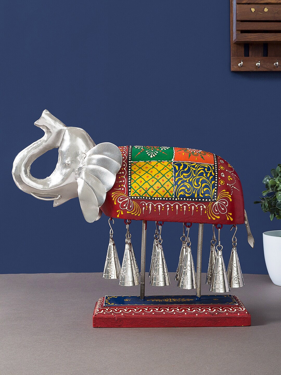 

Golden Peacock Red & Silver-Toned Handcrafted Wooden Elephant With Bell Showpiece