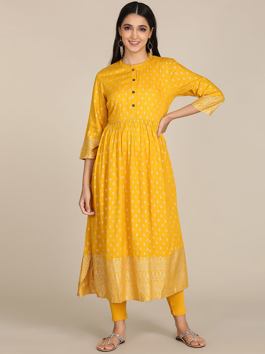 

Karigari Women Yellow & Gold-Toned Printed Flared Anarkali Kurta