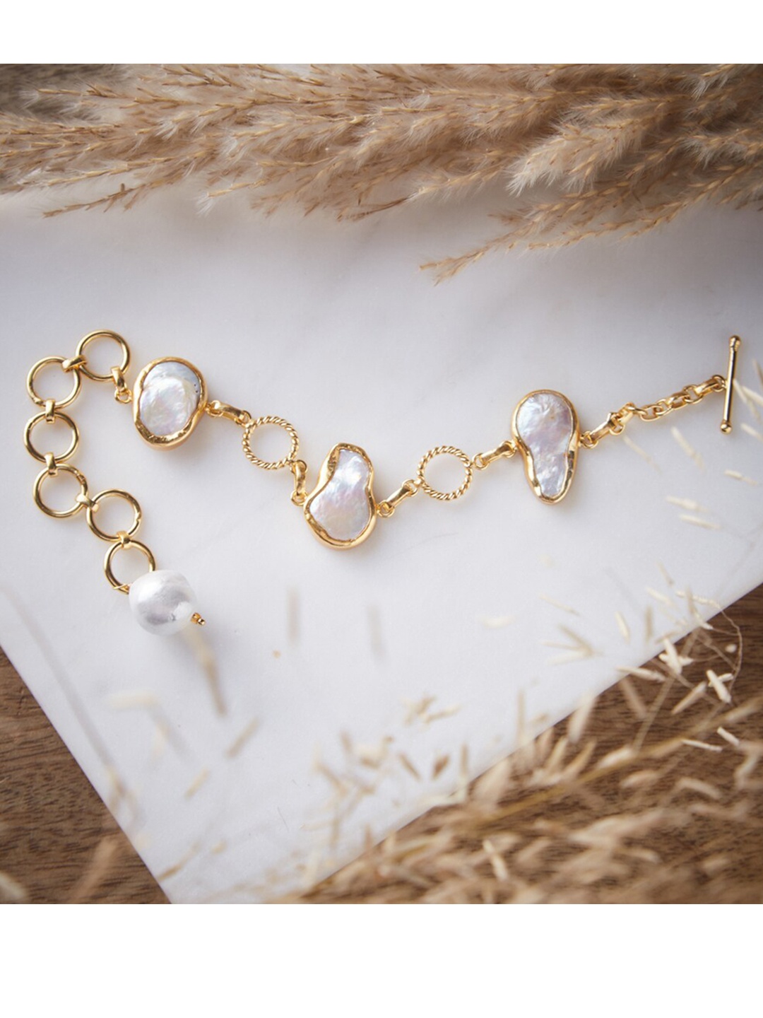 

ATIBELLE Women Gold-Toned & White Brass Link Bracelet