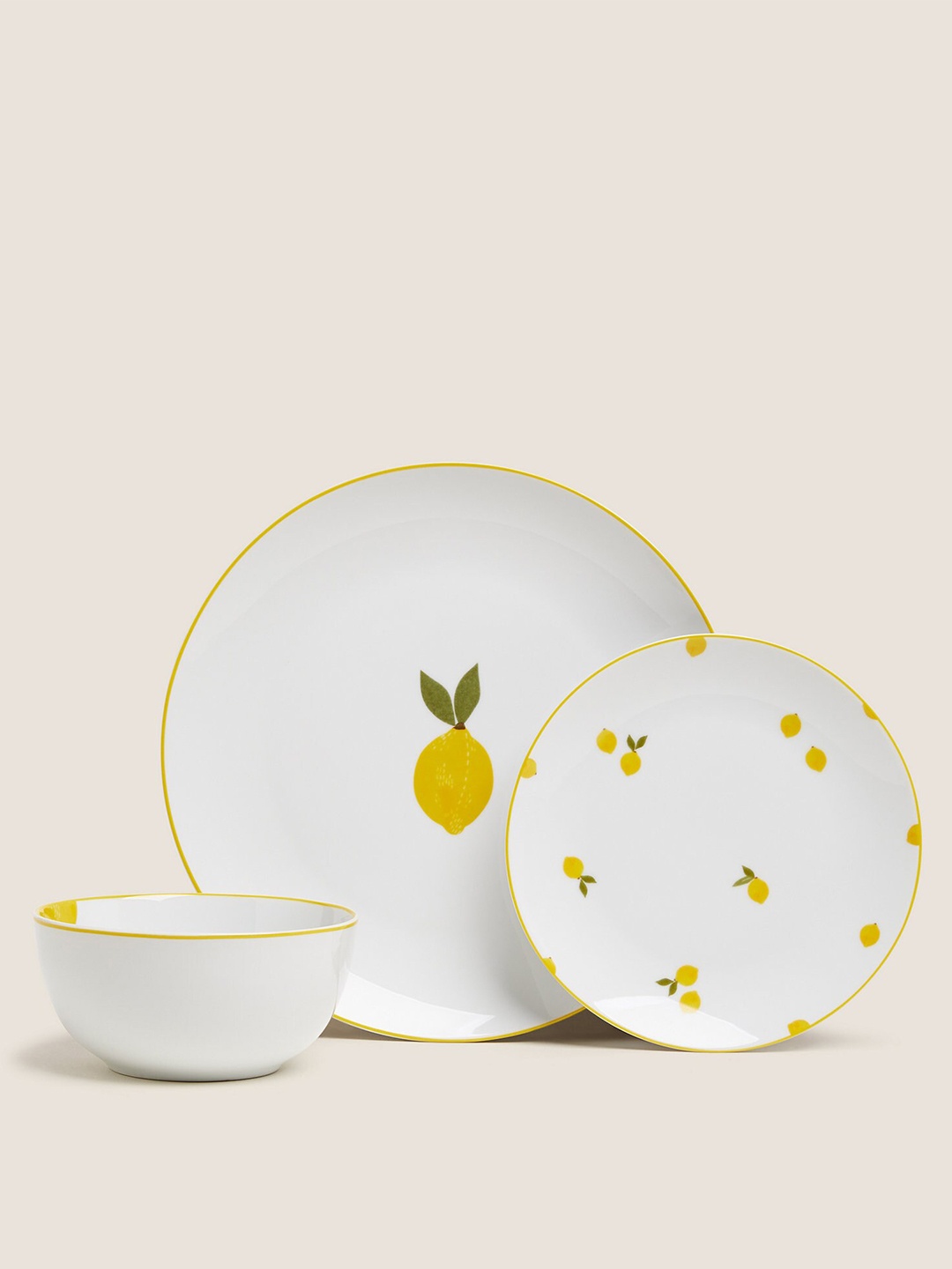 

Marks & Spencer Set Of 12 White & Yellow Printed Porcelain Dinner Set
