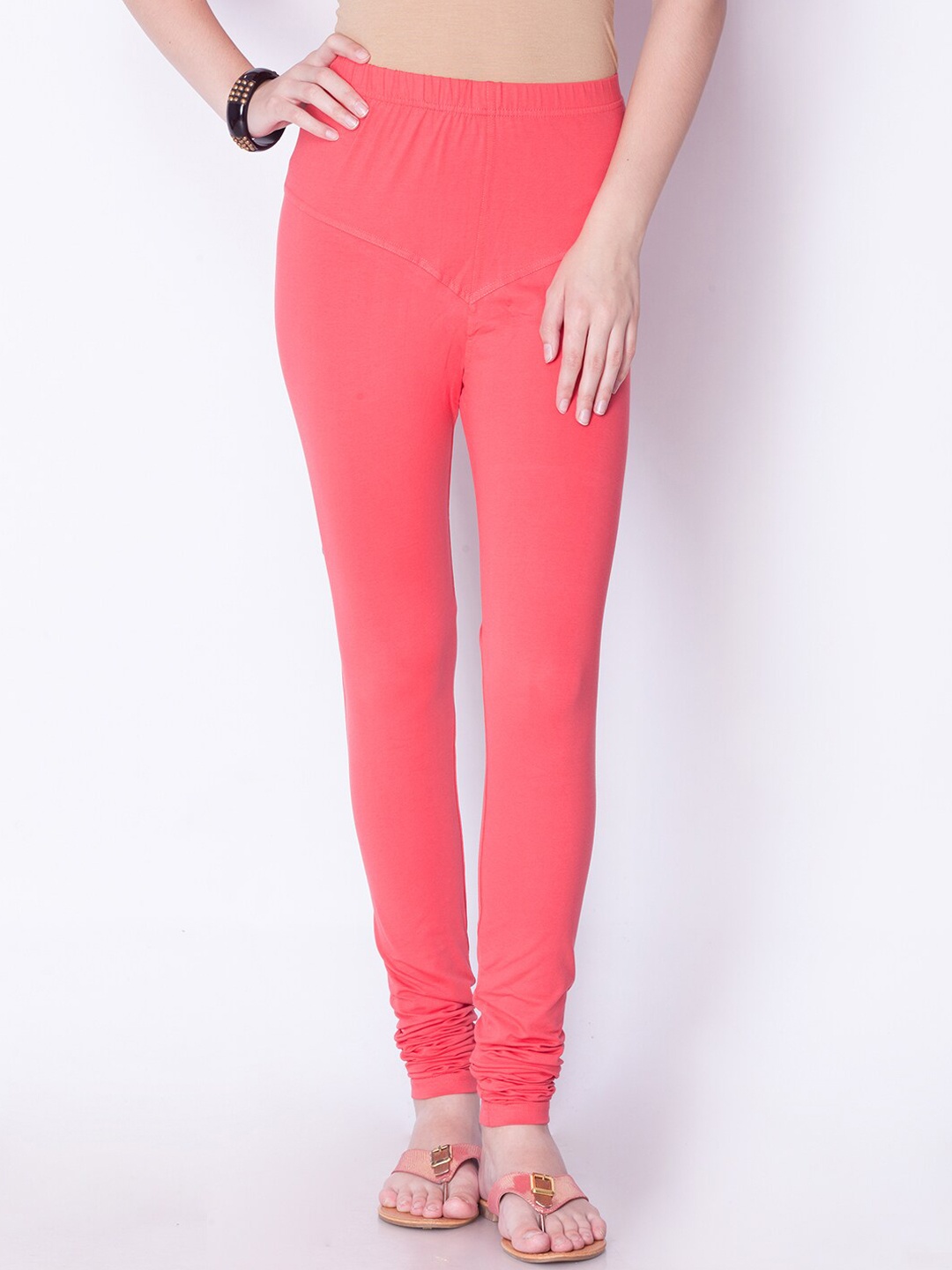 

Dollar Missy Women Coral Solid Slim-Fit Cotton Churidar Leggings