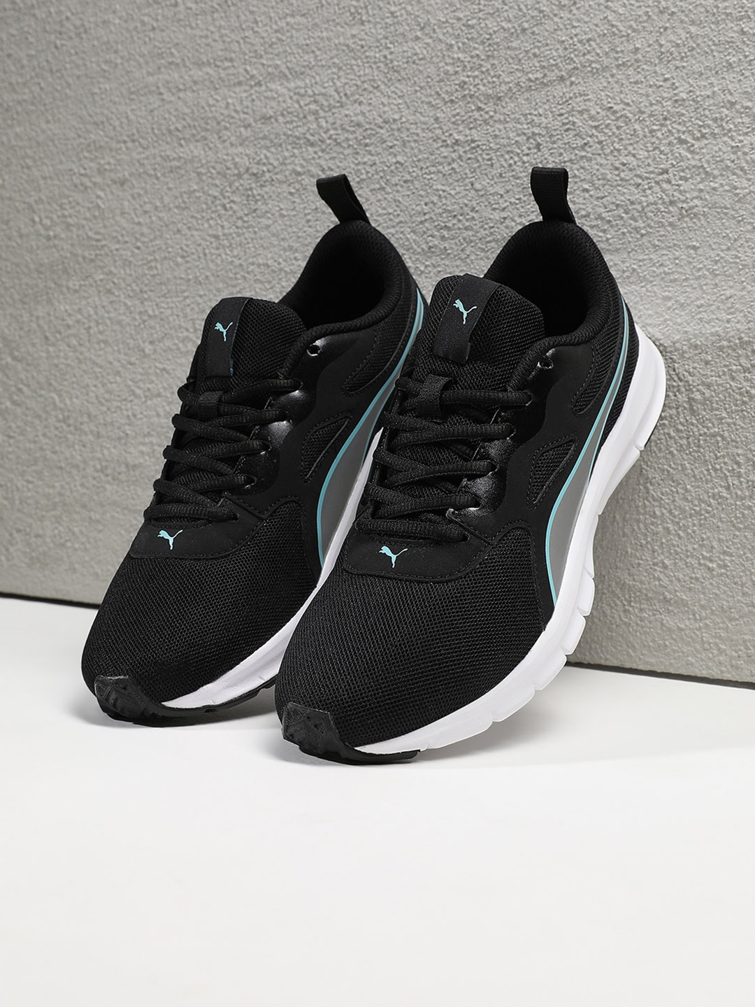 

Puma Women Black Textured Sneakers