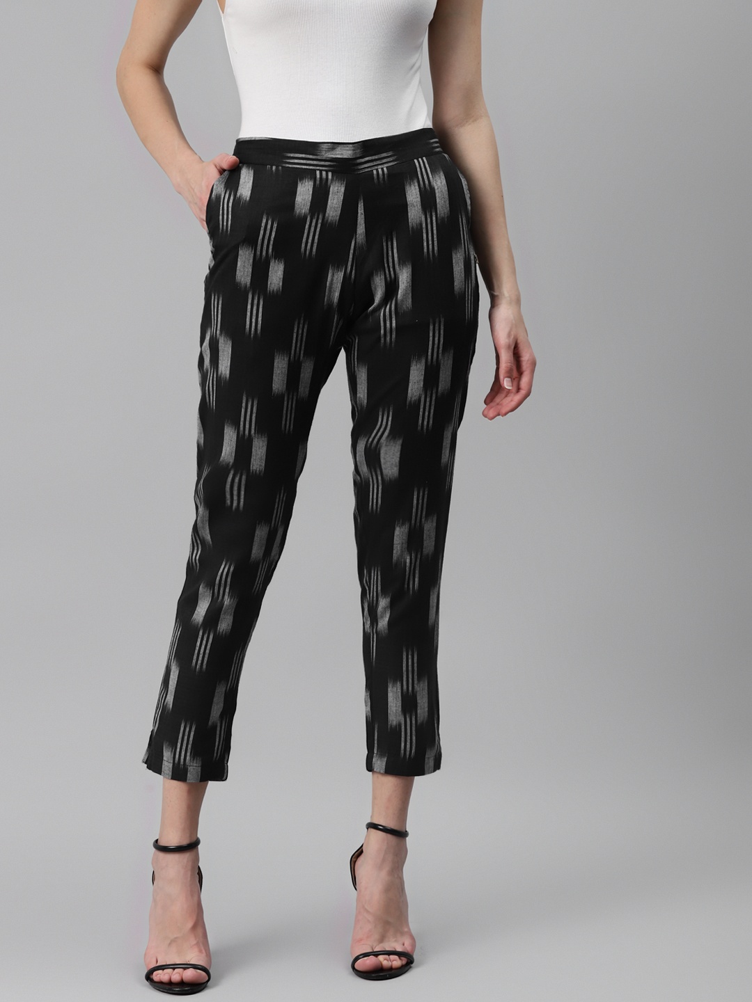 

FABNEST Women Black Printed Relaxed Pure Cotton Trousers