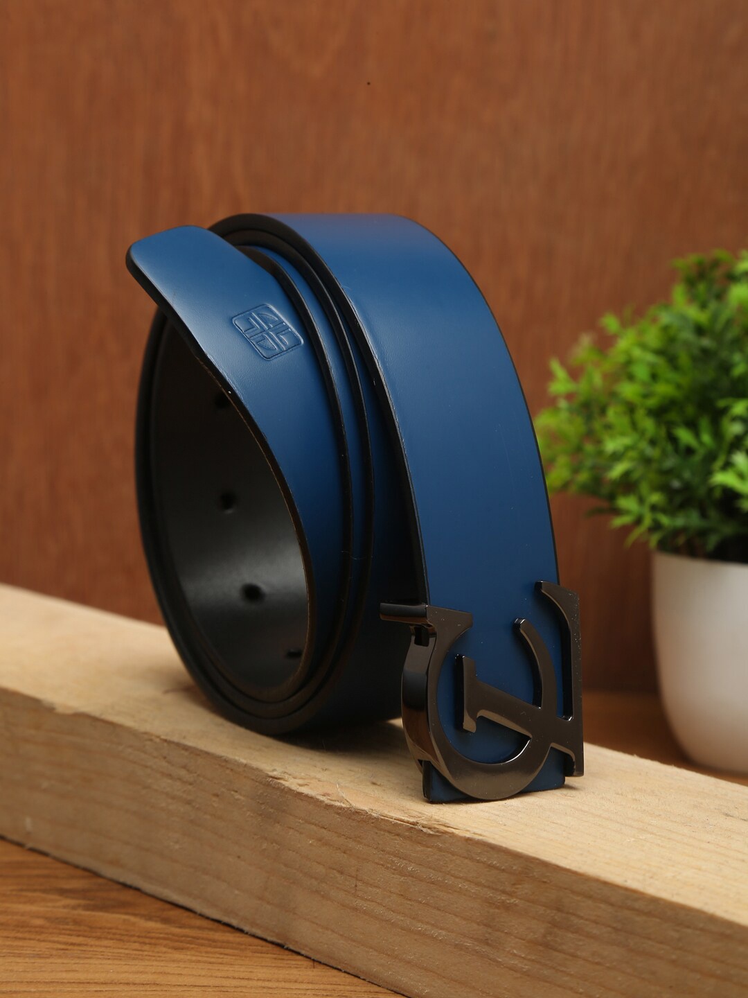 

Carlton London Men Blue Solid Casual Leather Belt