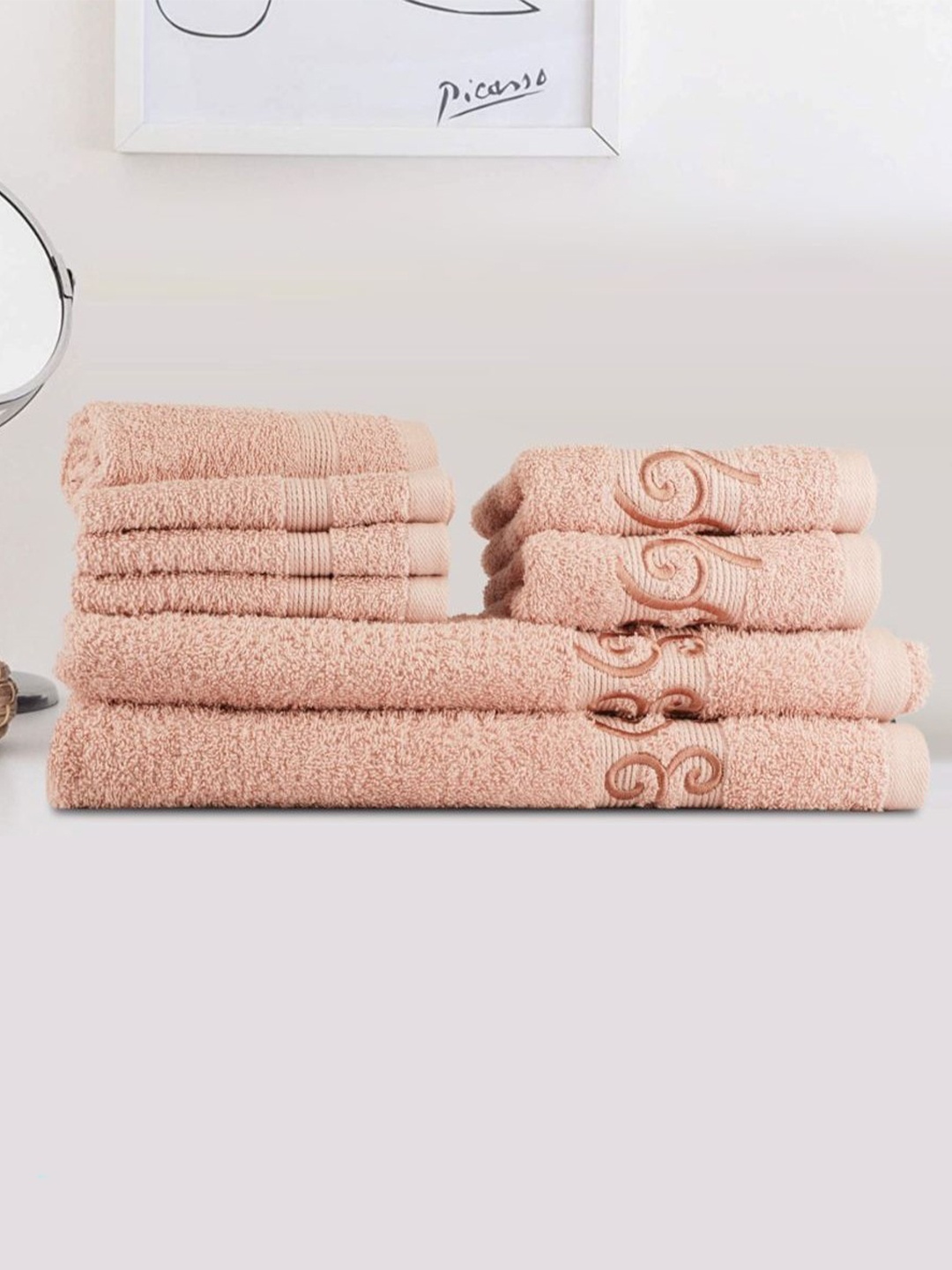 

LUSH & BEYOND Set of 8 Peach Coloured Self Design 500 GSM Cotton Towel Set
