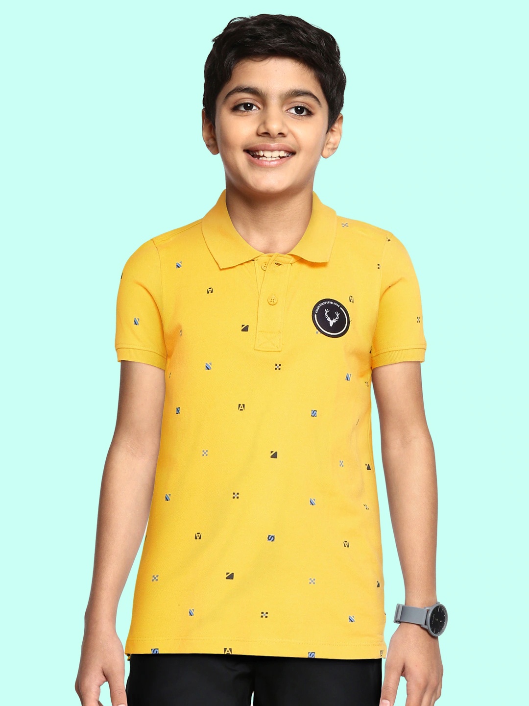 

Allen Solly Junior Boys Yellow & Blue Printed Polo Collar Pure Cotton T-shirt