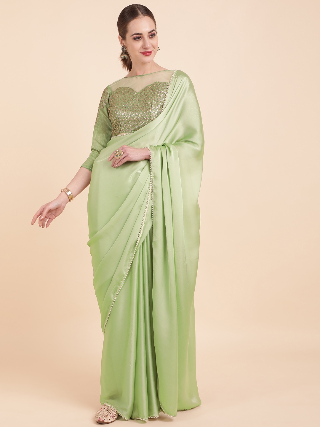 

Sangria Olive Green Sequinned Satin Saree