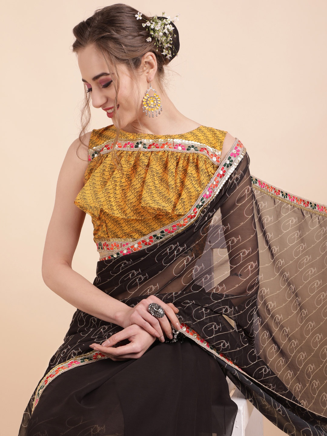 

Sangria Black & Pink Ethnic Motifs Embroidered Pure Georgette Saree