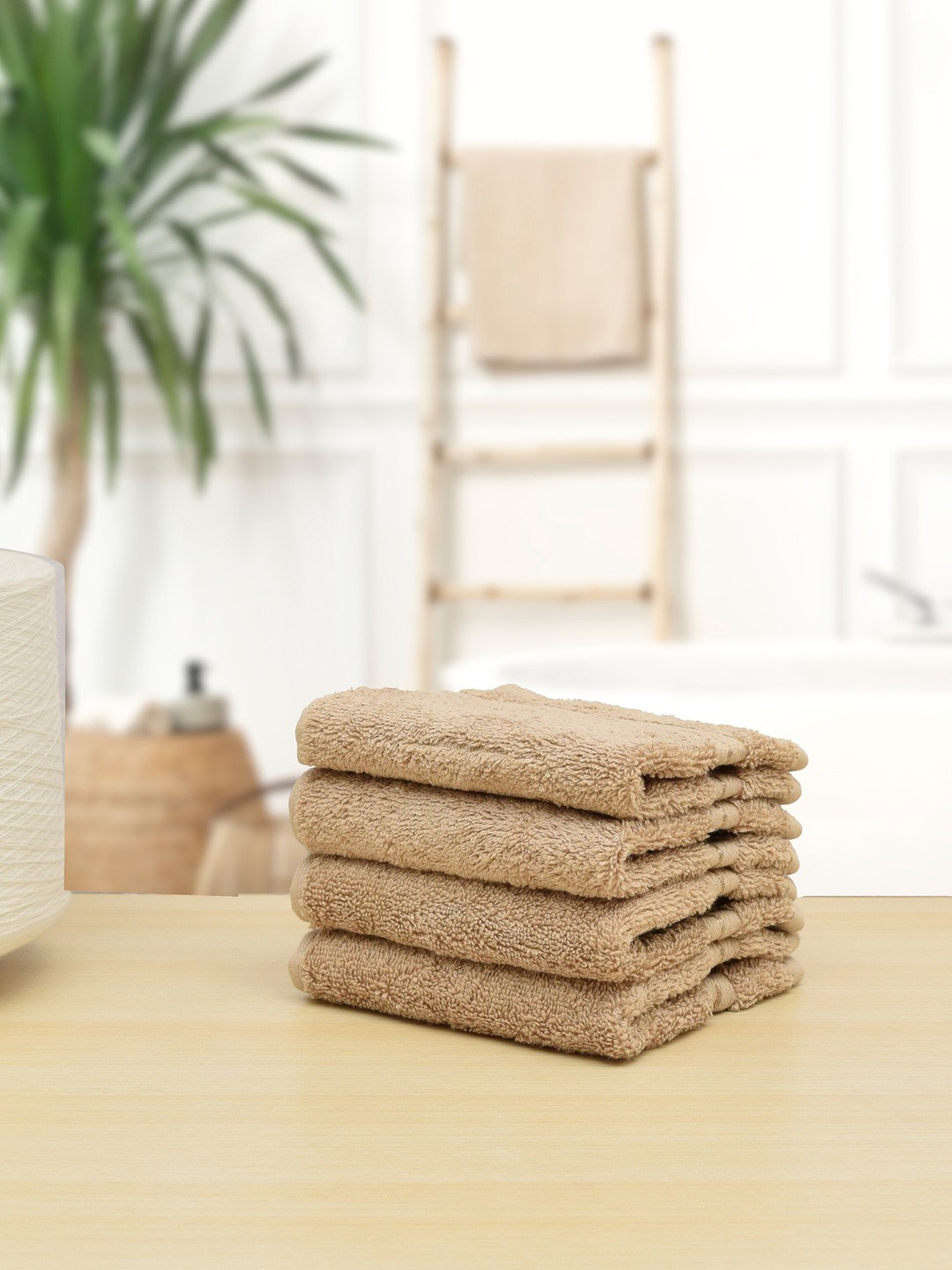 

RANGOLI Set Of 4 Beige Solid 620 GSM Pure Cotton Face Towels