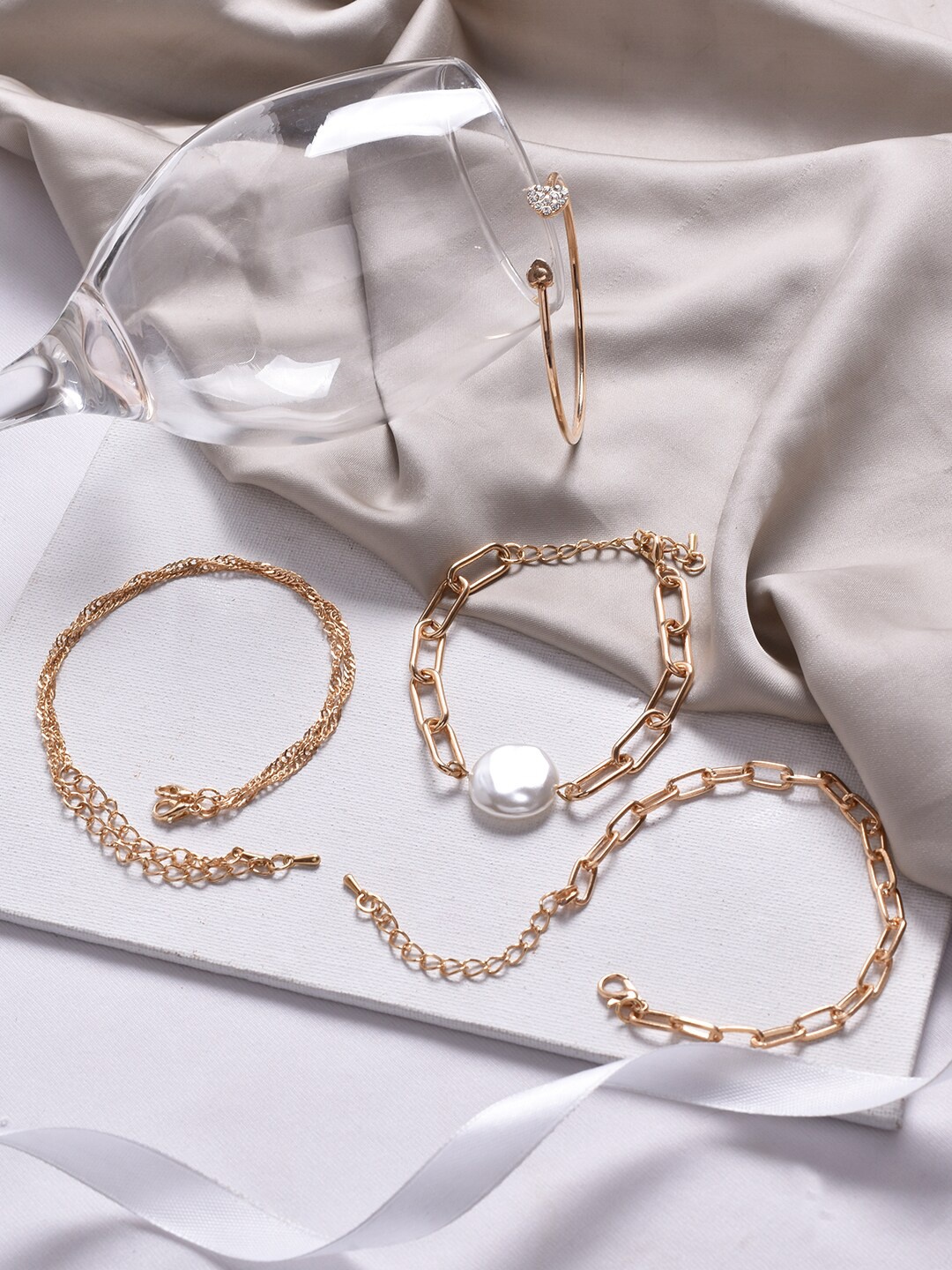 

JOKER & WITCH Women Gold-Toned & White Set Of 4 Cuff Bracelet