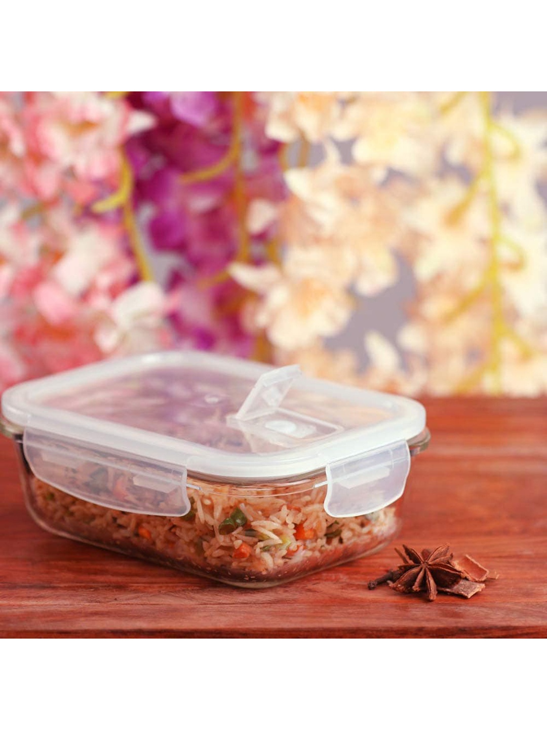 

Femora Transparent Borosilicate Glass Rectangular Container with Air Vent Lid 1000 ML