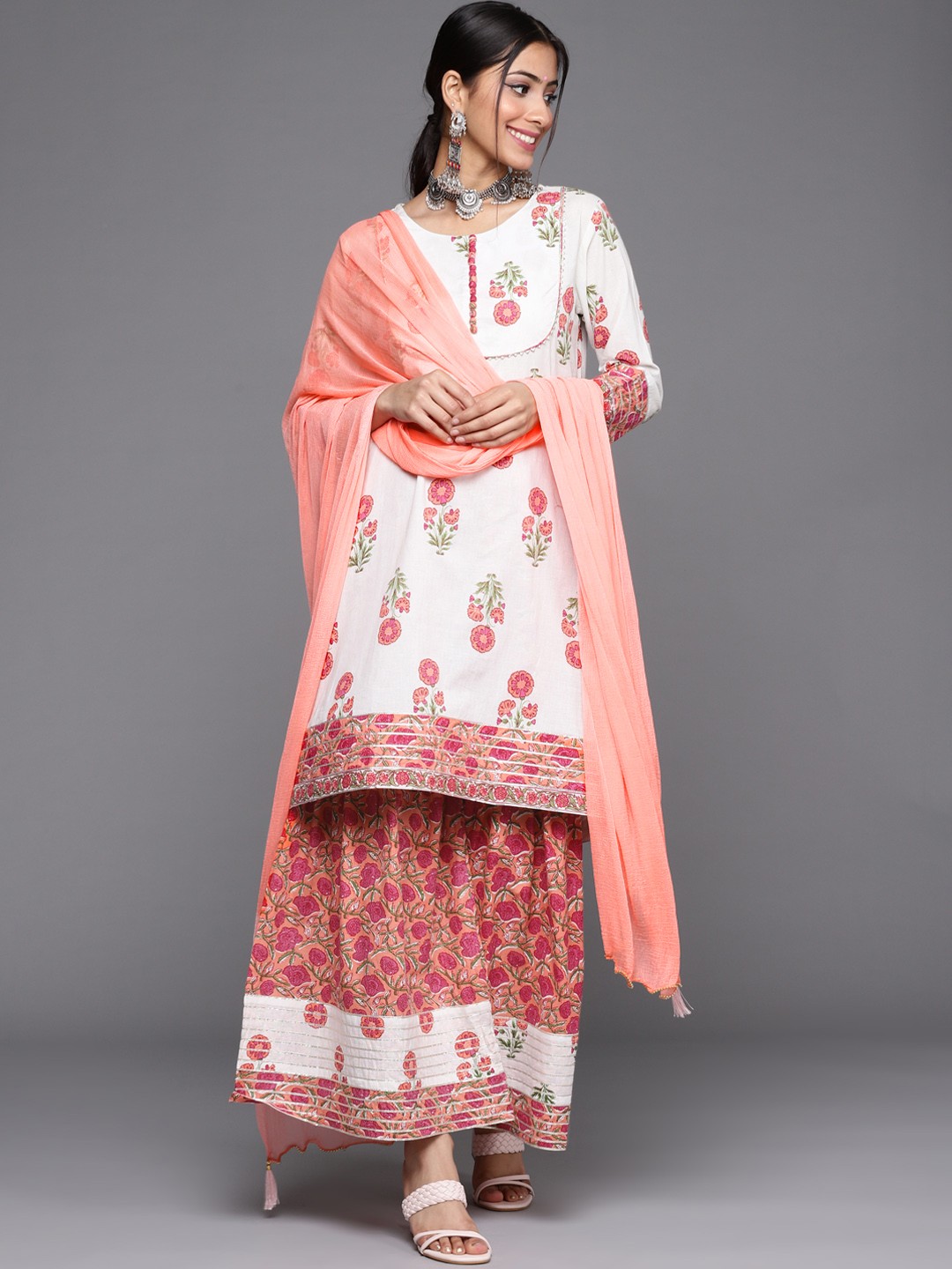 

Varanga Women White & Peach-Coloured Screen Print A-Line Kurta with Sharara & With Dupatta