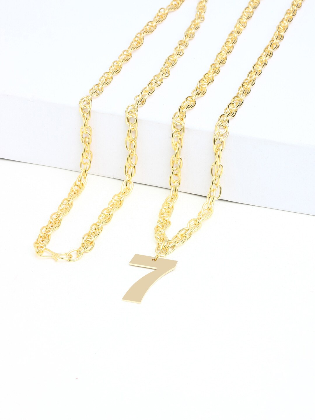 

Goldnera Men Brass-Plated Gold-Toned Number Pendant With Chain