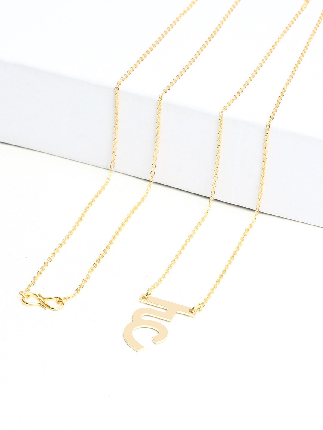

Goldnera Brass-Plated Gold-Toned Hindi Akshar Letter Charm Pendant With Chain