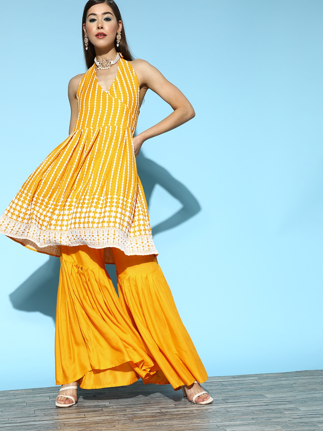 

InWeave Mustard Viscose Rayon Ethereal Embroidery Kurta Set