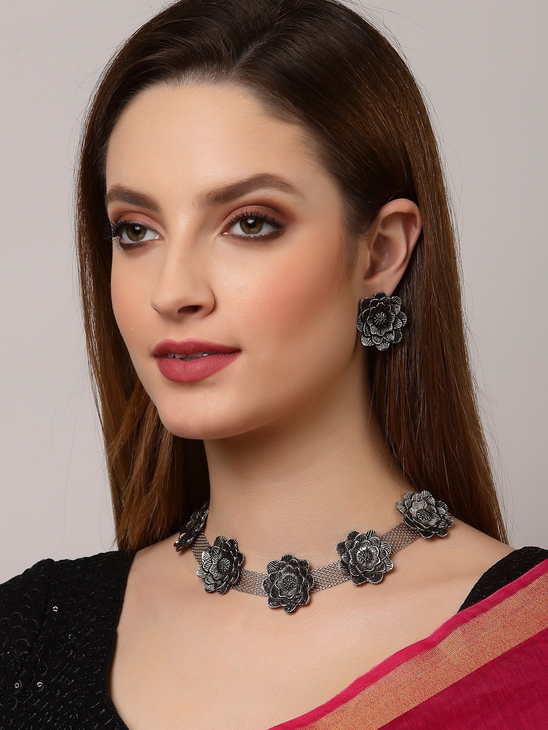 

Arrabi Women Silver-Toned & Black Oxidised Floral Jewellery Set