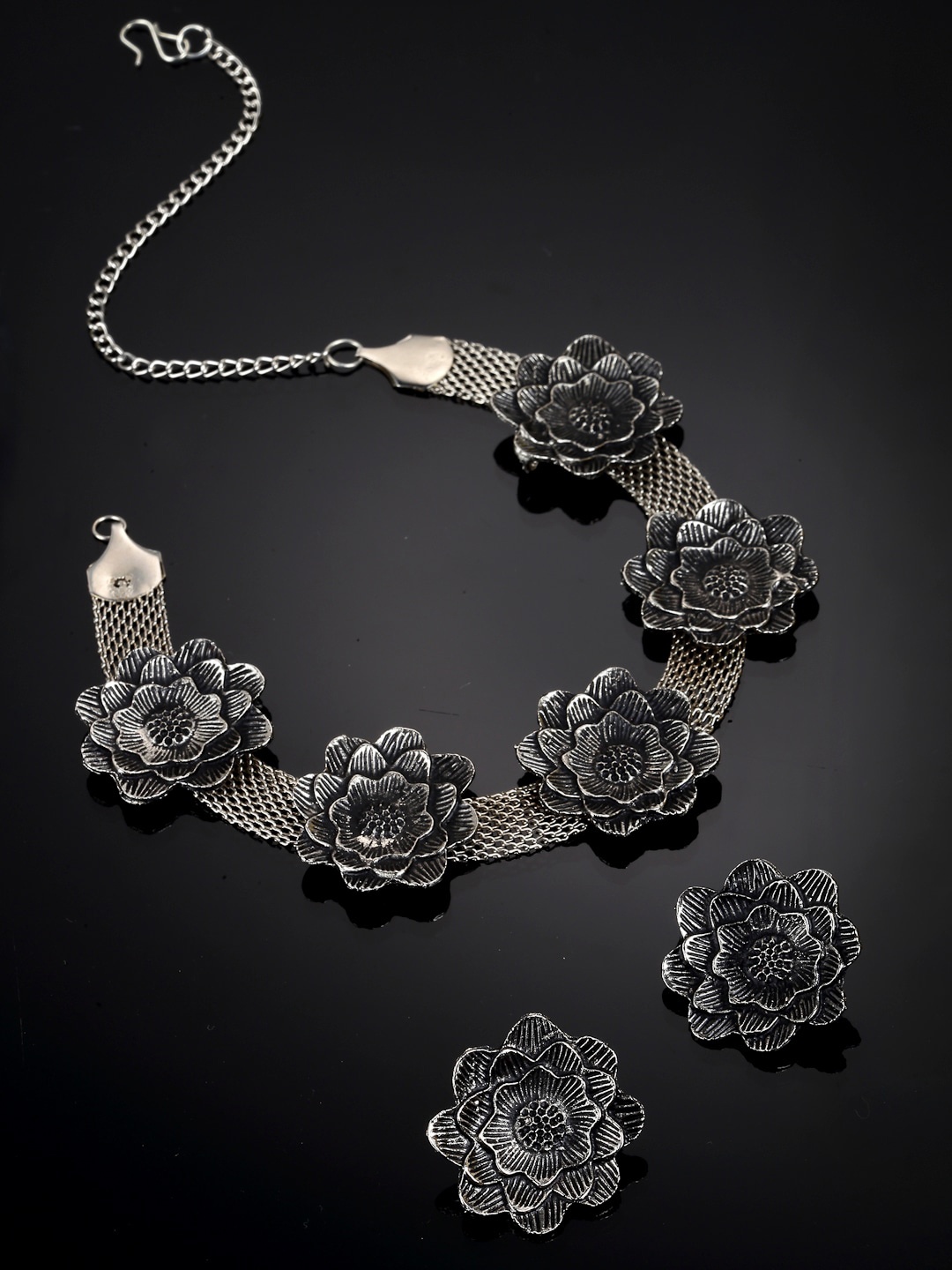 

Arrabi Women Silver-Toned & Black Oxidised Floral Jewellery Set