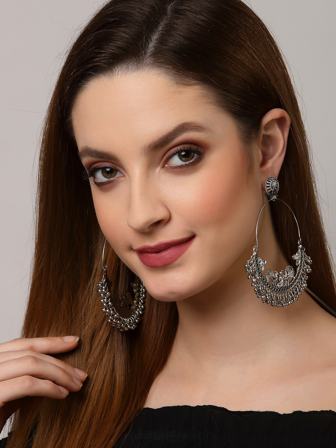 

Arrabi Women Silver-Toned Teardrop Shaped Oxidized Chandbalis