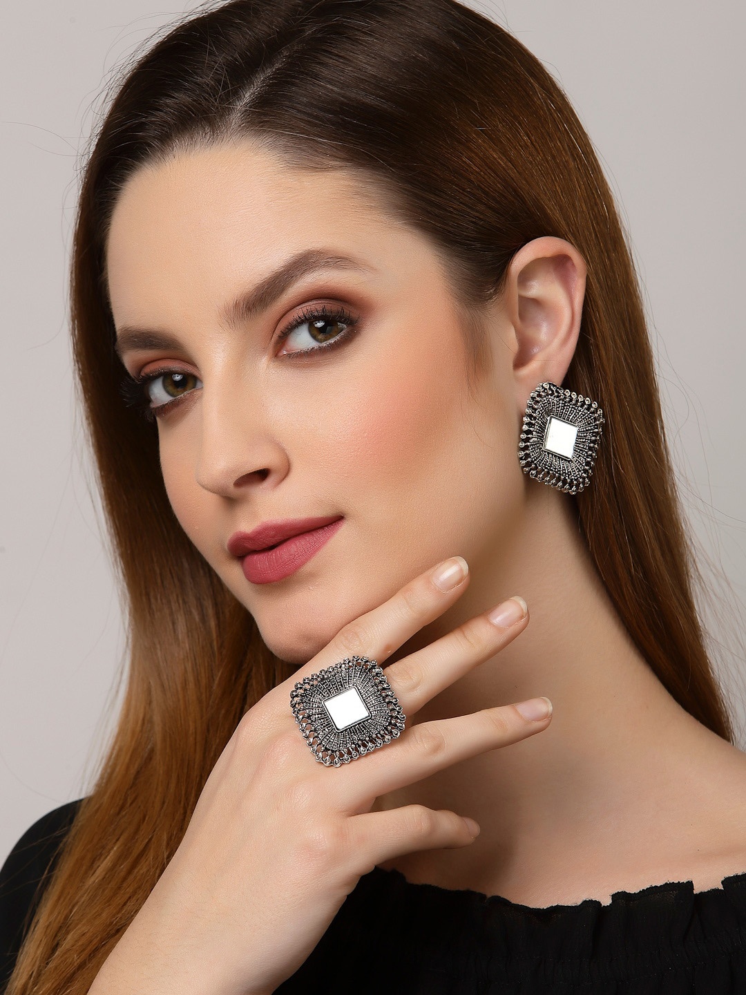 

Arrabi Silver-Toned Oxidised Studs Earrings & Finger Ring