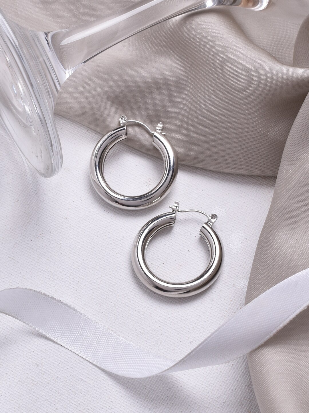 

JOKER & WITCH Silver-Toned Contemporary Hoop Earrings